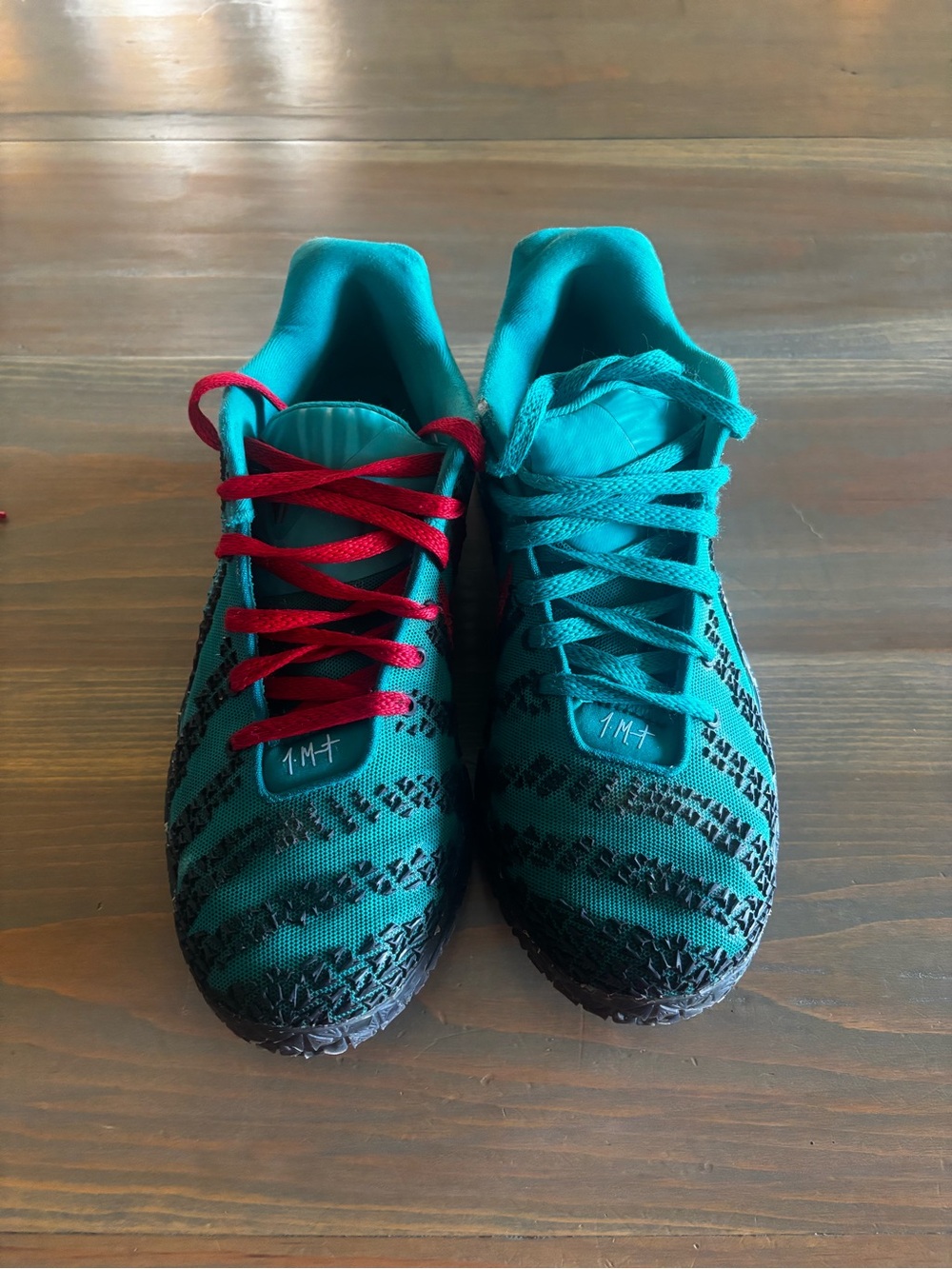 Men's Athletic Nike Shoes in Teal with Red Accent